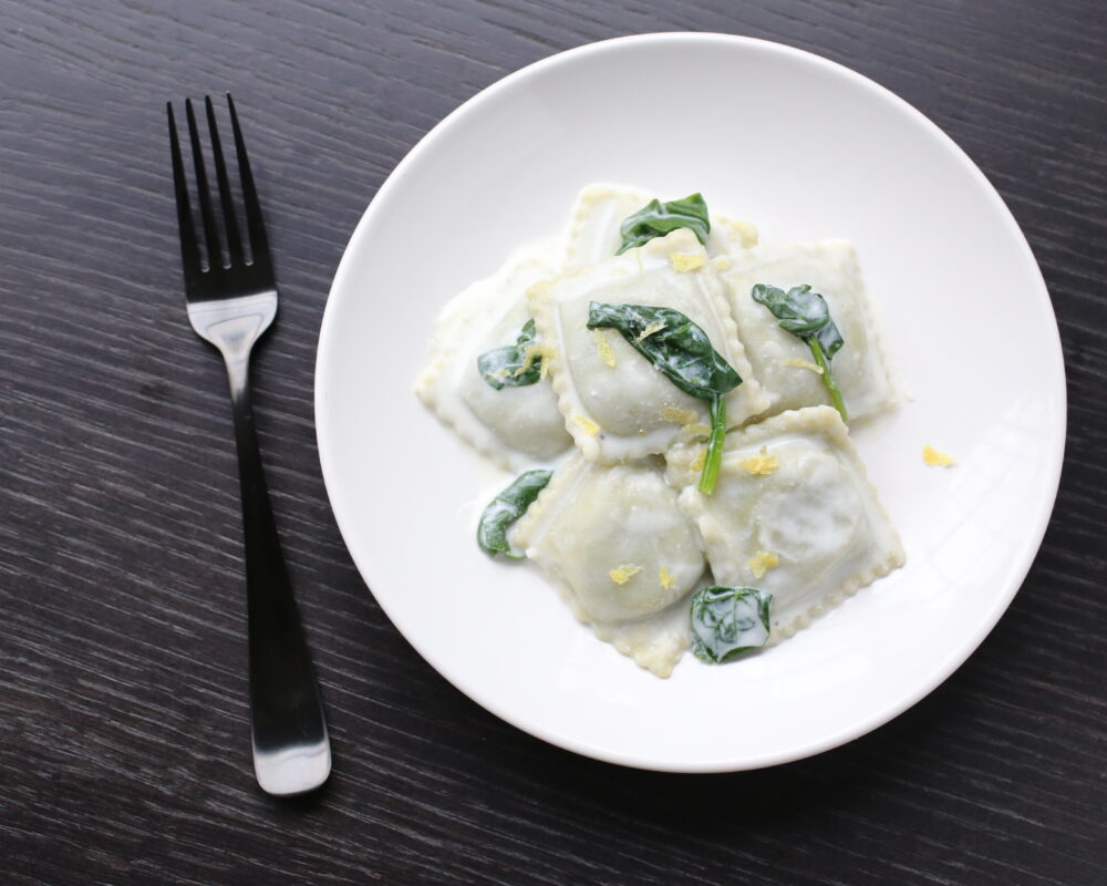 Spinach Ravioli with Lemony Ricotta Sauce and Wilted Spinach